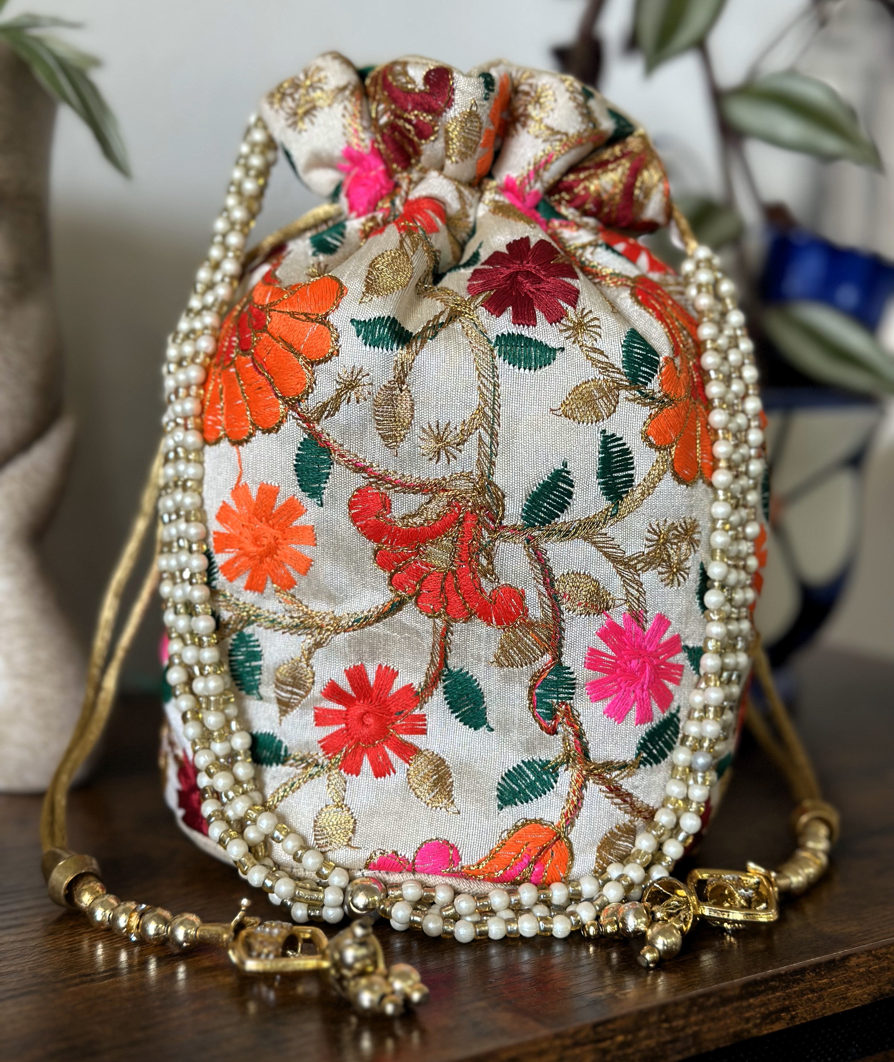 Buy NR BY NIDHI RATHI Women Peach-Coloured & White Embroidered Potli Clutch  online